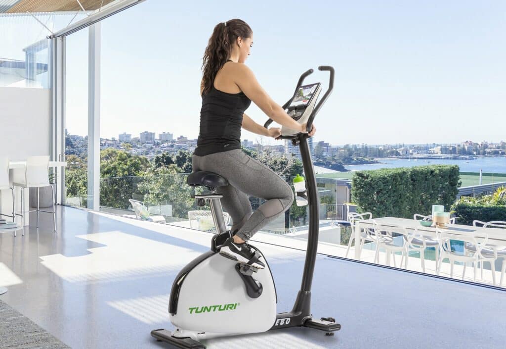 Couple sitting in a modern open plan house.